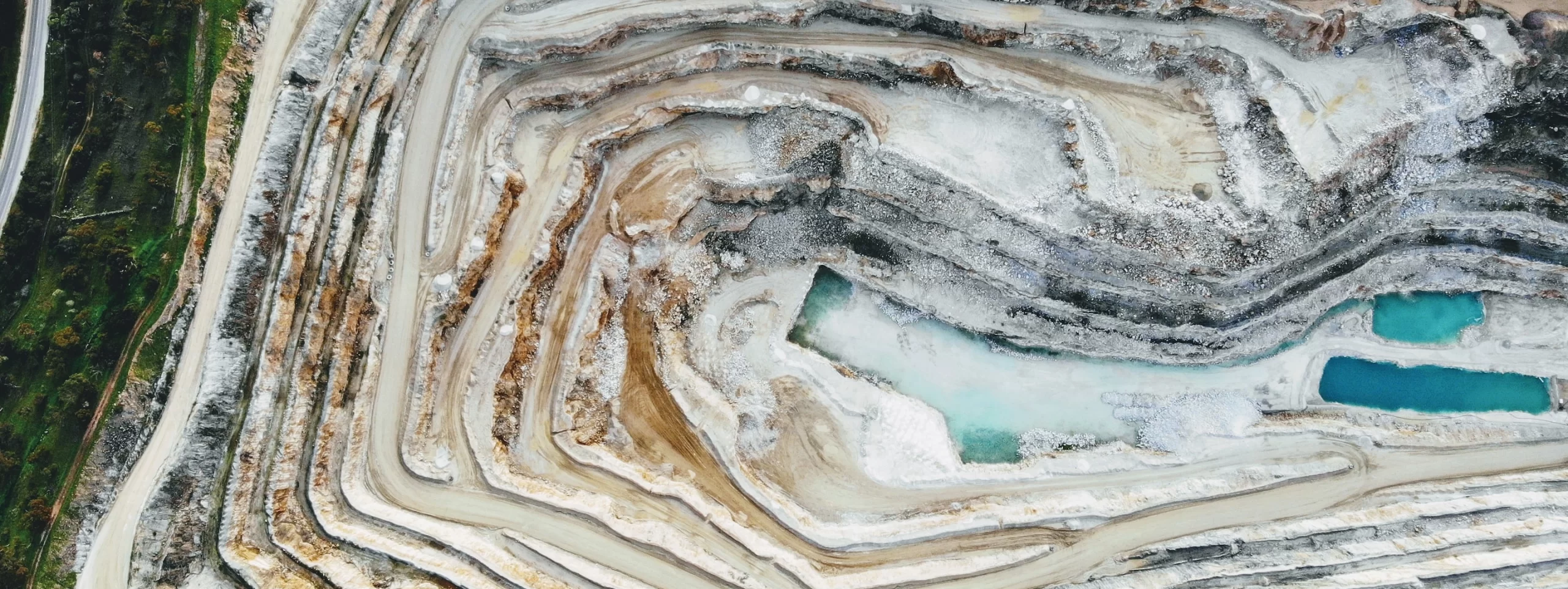 An aerial view of a quarry showcasing mining operations.